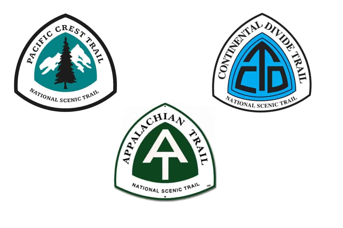 The three badges of the triple crown of hiking, the appalachian trail, pacific crest trail, and the continental divide trail